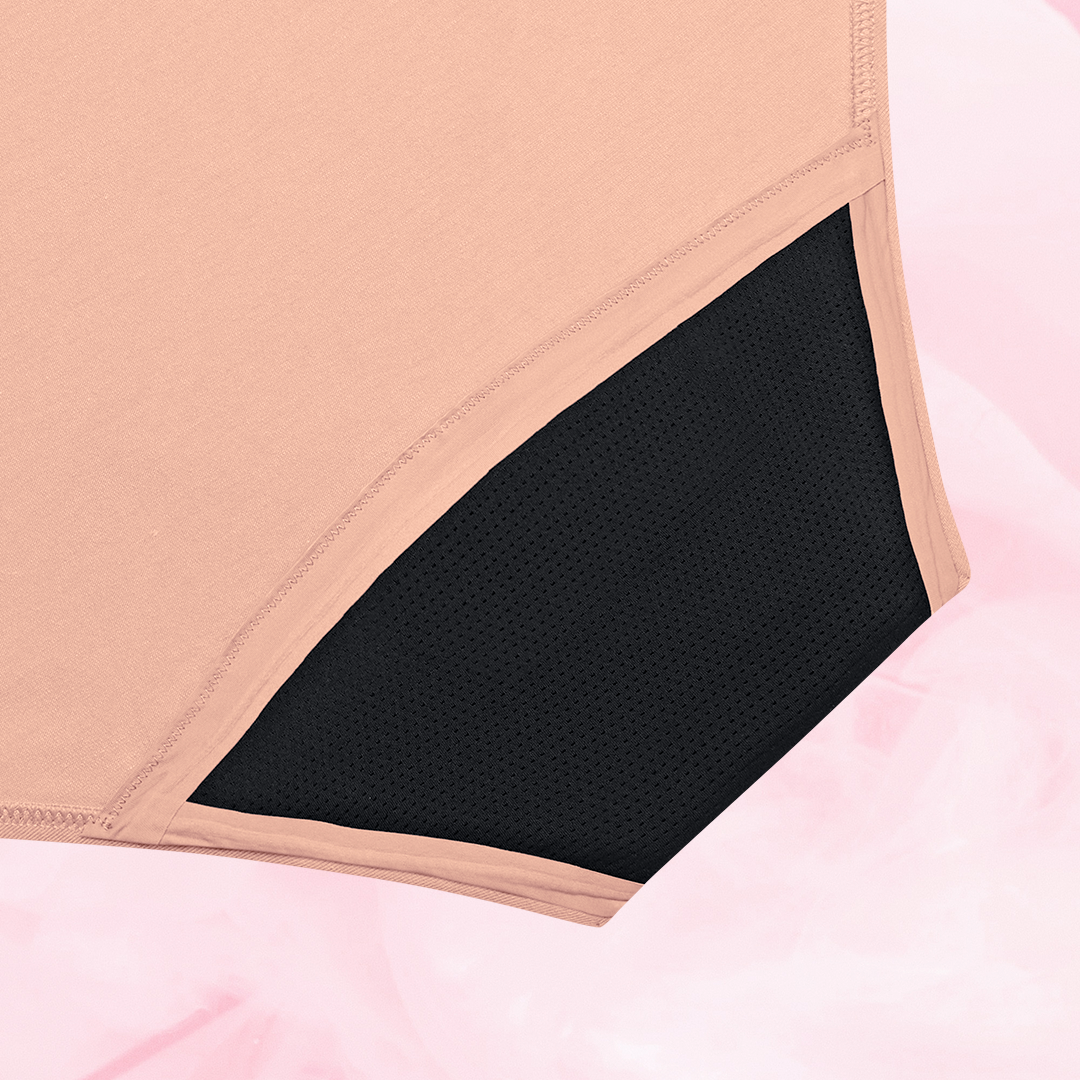 ComfortFit Essentials Hipster Heavy, a sleek black and pink period pant, featuring a tailored gusset and slimline edges for secure, discreet protection.