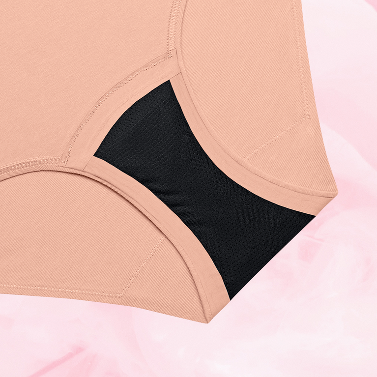 ComfortFit Essentials Hipster Light period pants, featuring a high waist and slimline edges for discreet protection, with a focus on comfort and reliable 12-hour coverage.