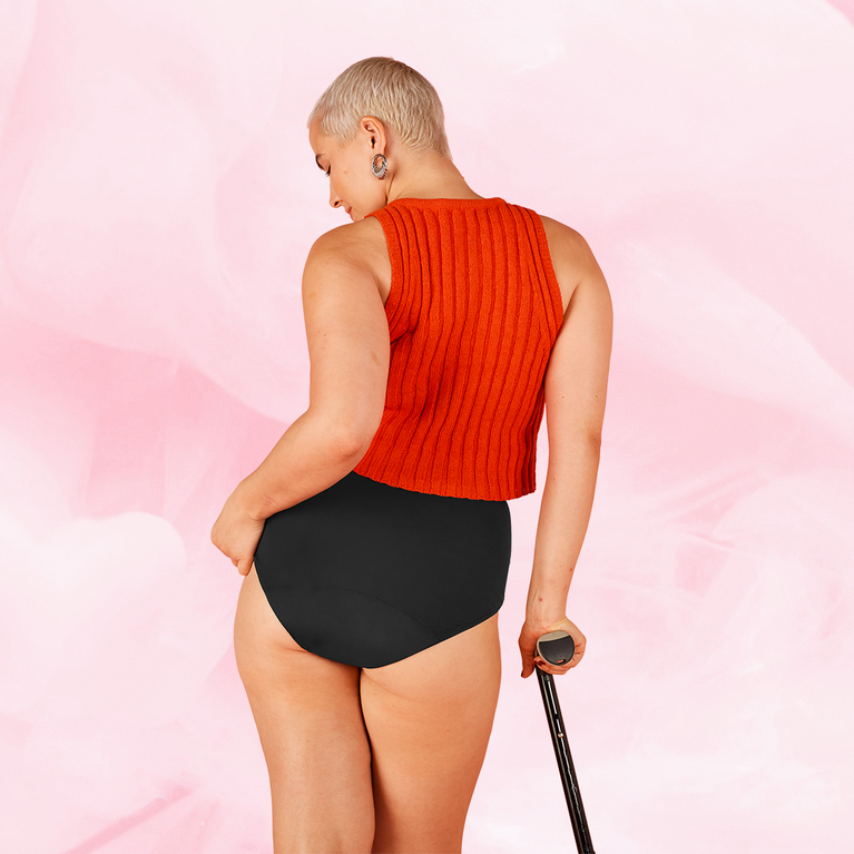 ComfortFit High Waist Moderate period pants on a woman, showcasing their high-waisted design and tailored fit for discreet, reliable protection.