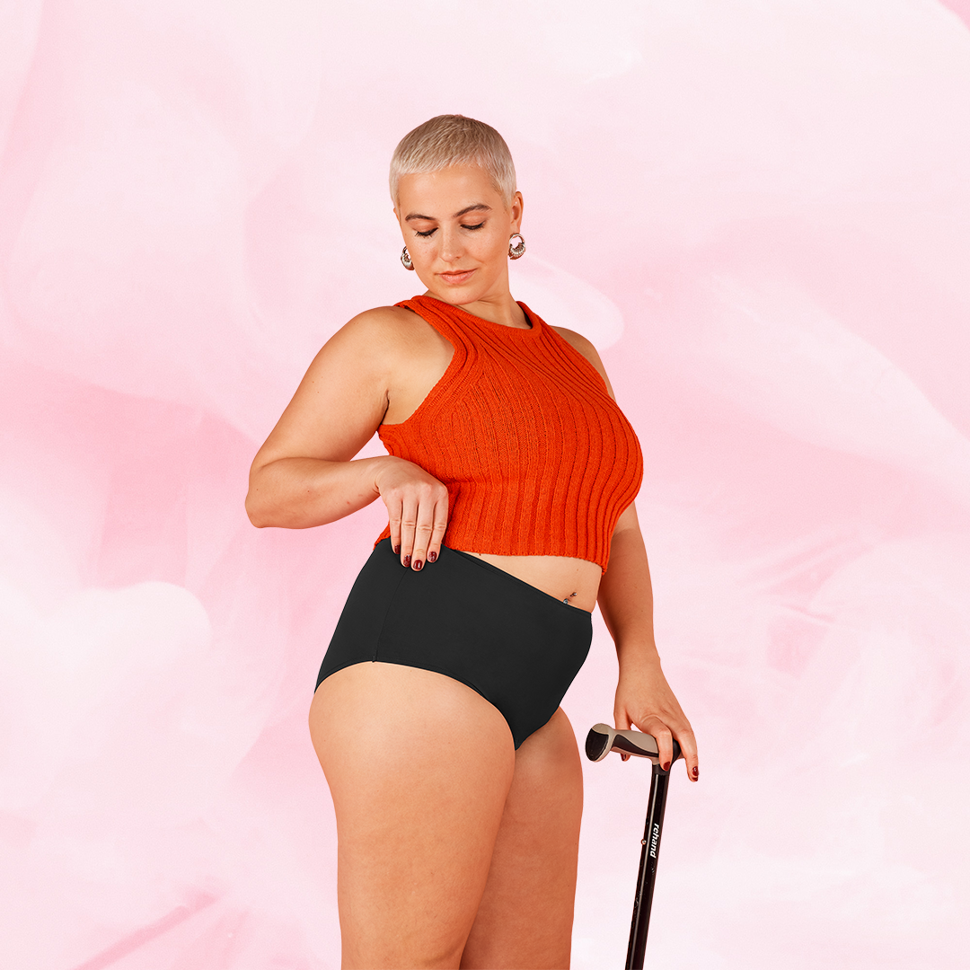 ComfortFit High Waist Heavy period pants on a woman, showcasing a high-waist design for comfort, featuring a tailored fit and slimline edges for discreet, reliable protection.