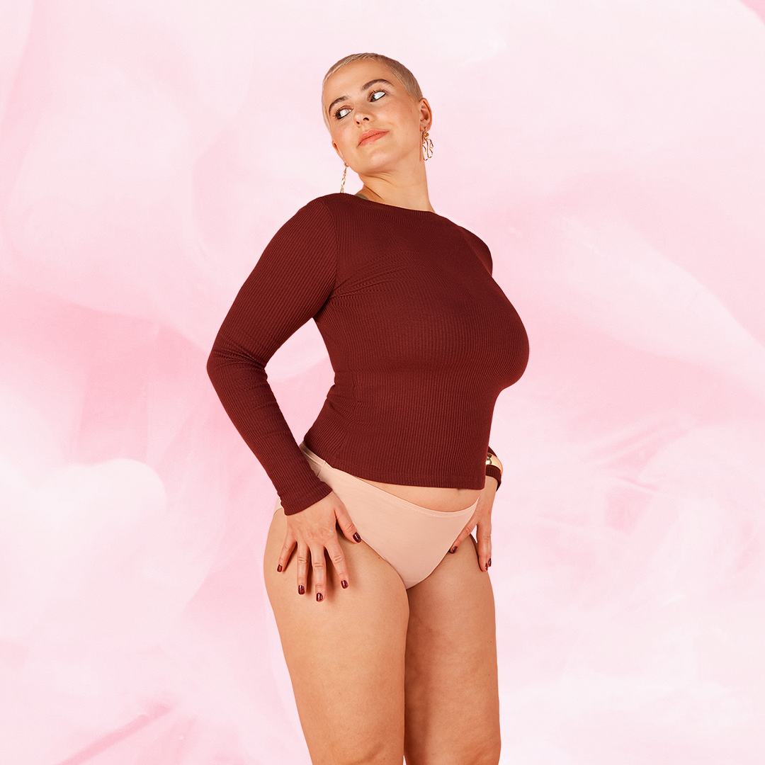 Woman wearing ComfortFit Essentials Brazilian Heavy period pants, emphasizing a close fit with discreet protection, showcasing the innovative design and functional features.