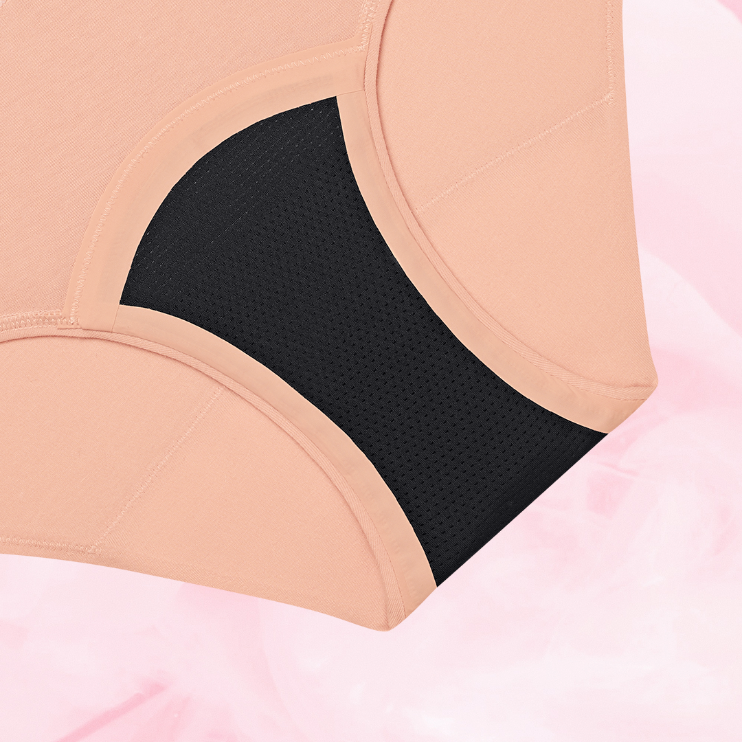 Close-up of ComfortFit Essentials Hipster Logo Waistband Heavy period pants, showcasing slimline edges and logo waistband designed for comfort and reliable protection.