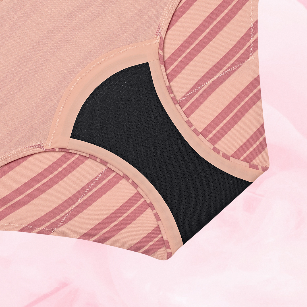 ComfortFit Essentials Hipster Heavy period pants featuring a close-fitting design with slimline edges, showcasing a textured fabric pattern ideal for reliable, discreet protection.