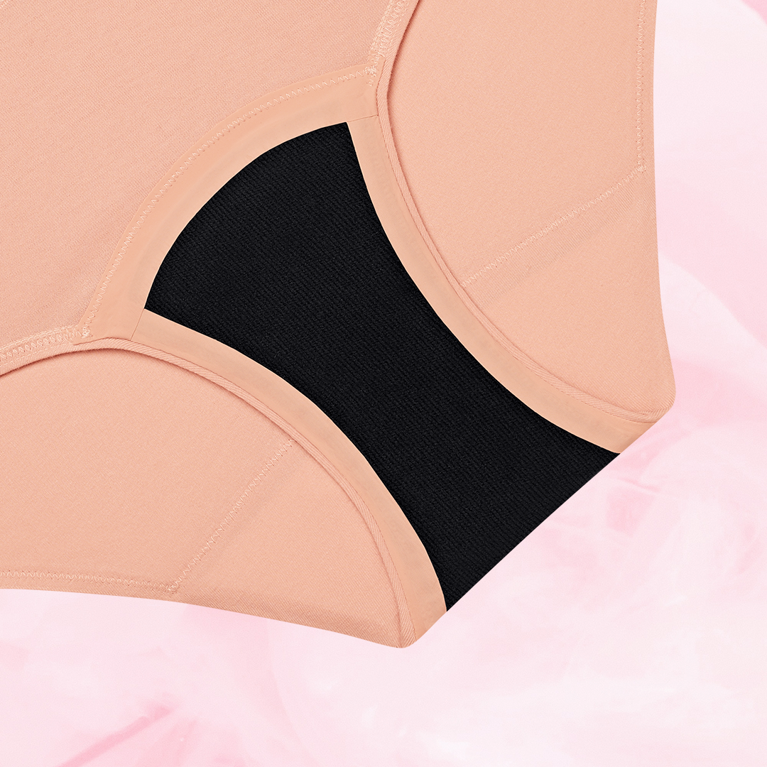ComfortFit Essentials Hipster Logo Waistband Moderate period pants, showcasing a close-up of their fit and soft fabric designed for discreet, reliable protection.